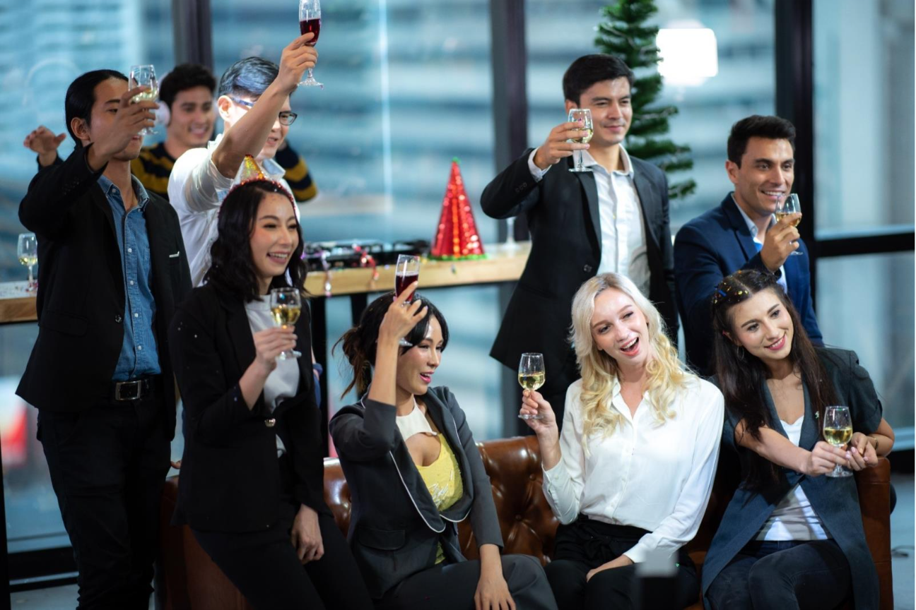 A group of people holding wine glasses

AI-generated content may be incorrect.